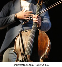 The Final Bow Of Cellist At The Stage