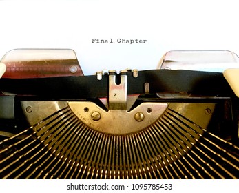 Final Chapter, manuscript heading or title typed in black ink on white paper on old vintage manual typewriter machine