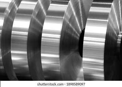 final coils of aluminum foil after sliting on the axis machine, black and white photo - Shutterstock ID 1898589097