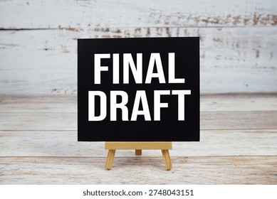 Final Draft text with easel on wooden background