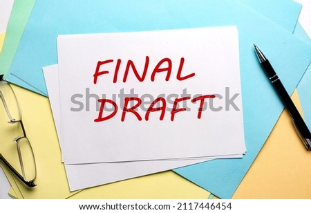 FINAL DRAFT text on paper on colorful paper background