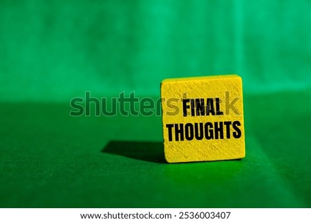 Final thoughts message written on yellow wooden cube with green background. Conceptual final thoughts symbol. Copy space.