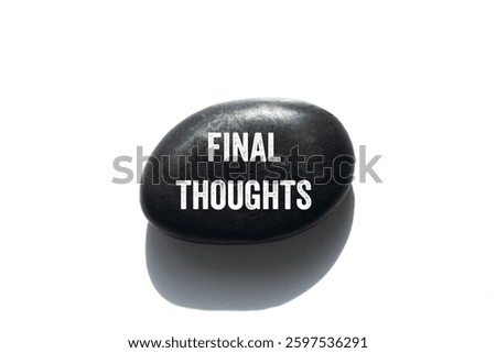 Final thoughts message written on black stone on white background. Conceptual final thoughts symbol. Copy space.