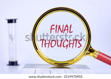 FINAL THOUGHTS Final Thoughts text Close-up through a magnifying glass, conceptual photo