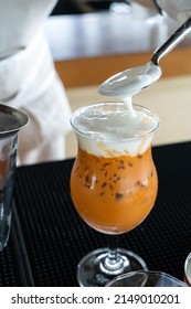 Final Touch Of Making Traditional Thai Iced Tea By Adding Milk Foam On Top