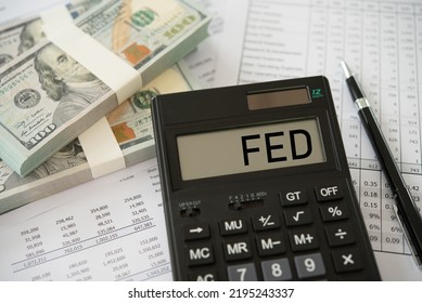 Finance Banking Economics Of Fed Concept. Federal Reserve Bank (fed) Word On Calculator With Dollar Money Banknote.