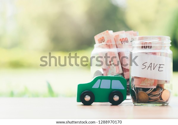 Finance and car
loan, saving money for a car concepts. Saving money for car or
trade car for cash, finance
concept