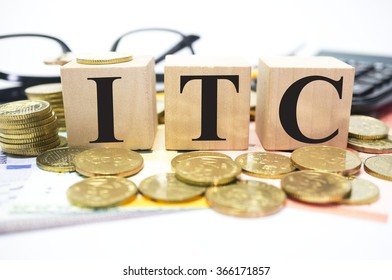 Finance Concept With Stack Of Coins, ITC Or International Trade Commission Written