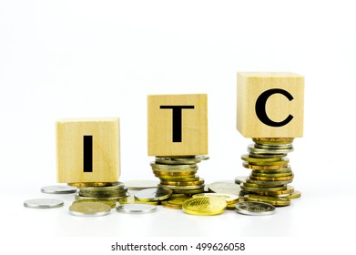 Finance Concept With Stack Of Coins - ITC (International Trade Commission) Written On