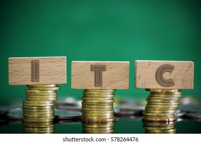 Finance Concept With Stack Of Coins - ITC (International Trade Commission) Written On