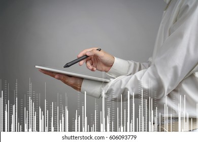 Finance data concept. Man working with Analytics. Chart graph information on digital screen.