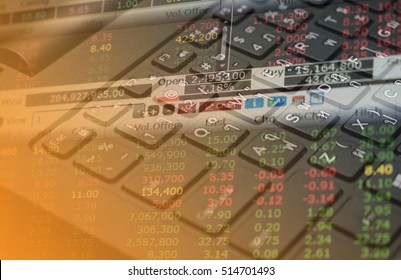 finance data on keyboard computer and graph business concept 
