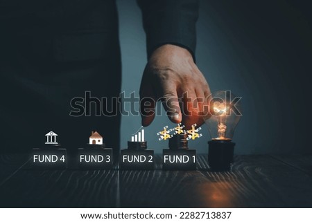Finance and Mutual funds concept.Businessman choose to investor in funds, financial and business target strategies, mutual funds and capital markets, future planning,Business growth, retirement,