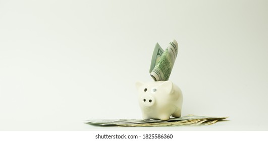 Finance, saving money, white piggy bank on seamless white background. Isolated - Shutterstock ID 1825586360