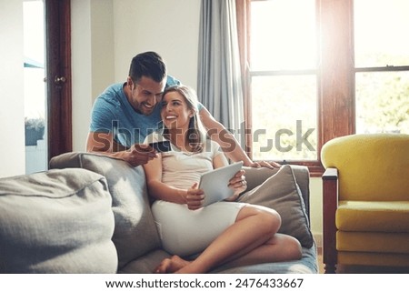 Similar – Image, Stock Photo Man and pregnant woman looking baby clothes