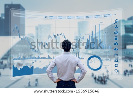 Finance trade manager analysing stock market indicators for best investment strategy, financial data and charts with business buildings in background