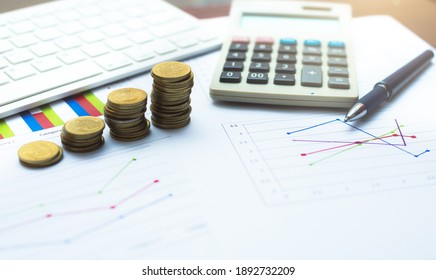 Financial Accounting Analytics Document Report Paperwork Progress Growth Graph With Money And Chart On Table With Pen Keyboard And Calculator Work For Business Planning.