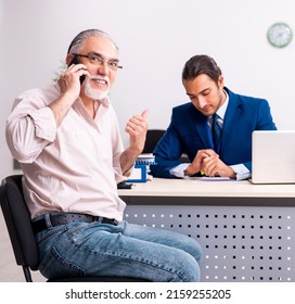 Financial Advisor Giving Retirement Advice To Old Man