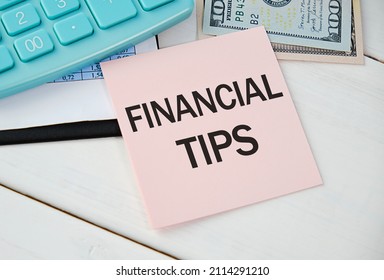 Financial Aid - Text Written On A Notebook With Office Wooden Background