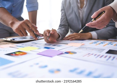 Financial Analyst Analyzes Businessman Investment Consultant Analyzing Company Financial Report Balance Sheet Statement Working With Documents Graphs. Concept Picture For Stock Market, Office, Tax