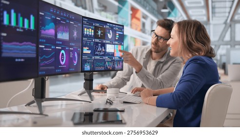 Financial Analyst Collaborates Using Data Dashboards To Enhance Business Performance And Predictive Management