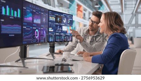 Financial Analyst Collaborates Using Data Dashboards To Enhance Business Performance And Predictive Management