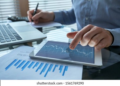 financial analytics, business man working with charts, fintech