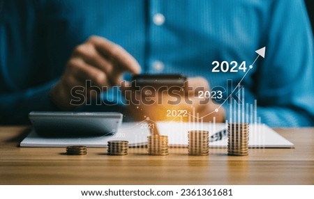 financial business growth 2024, Businessman analysis profitability of working companies with digital augmented reality graphics, Businessman calculating financial data for long-term investments Stock fotó © 