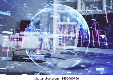 Financial chart drawing and table with computer on background. Multi exposure. Concept of international markets.