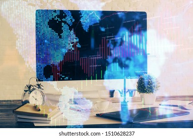 Financial chart drawing and table with computer on background. Double exposure. Concept of international markets.