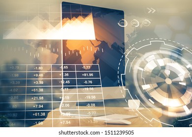 Financial chart drawing and table with computer on background. Double exposure. Concept of international markets.