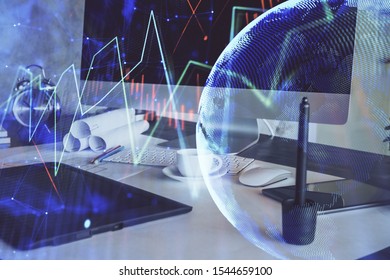 Financial chart drawing and table with computer on background. Double exposure. Concept of international markets.