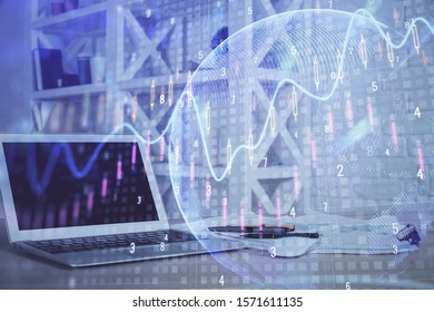 Financial chart drawing and table with computer on background. Multi exposure. Concept of international markets.