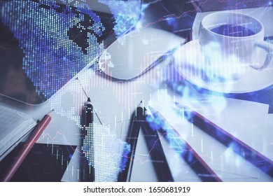 Financial chart drawing and table with computer on background. Double exposure. Concept of international markets.