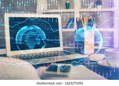 Financial chart drawing and table with computer on background. Multi exposure. Concept of international markets.