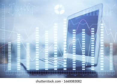 Financial chart drawing and table with computer on background. Multi exposure. Concept of international markets.