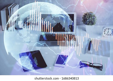 Financial chart drawing and table with computer on background. Multi exposure. Concept of international markets.