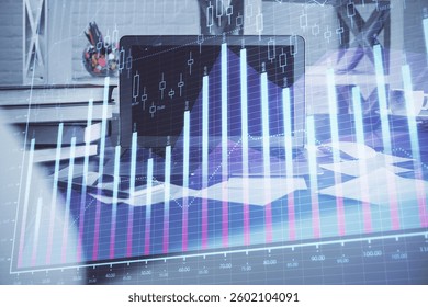 Financial chart drawing and table with computer on background. Multi exposure. Concept of international markets.