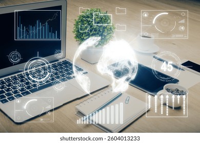 Financial chart drawing and table with computer on background. Multi exposure. Concept of international markets.