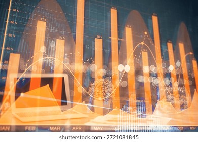 Financial chart drawing and table with computer on background. Multi exposure. Concept of international markets.