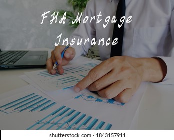 Financial Concept About FHA Mortgage Insurance With Phrase On The Sheet.
