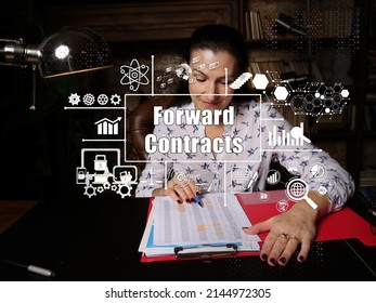 Financial Concept About Forward Contracts With Inscription. Young Finance Market Analyst In Eyeglasses Working While Sitting At Wooden Table On Background.
