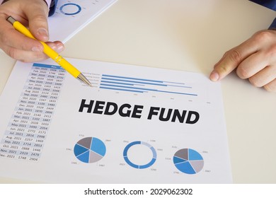 Financial concept about HEDGE FUND with sign on the chart sheet.  - Shutterstock ID 2029062302