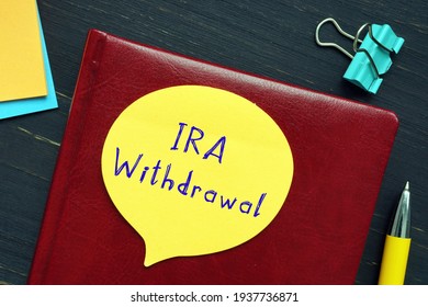 Financial Concept About Individual Retirement Accounts IRA Withdrawal With Inscription On The Page. 
