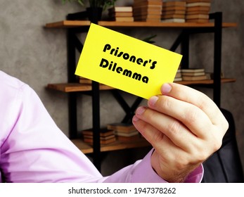  Financial Concept About Prisoner'S Dilemma With Phrase On The Yelow Business Card.
