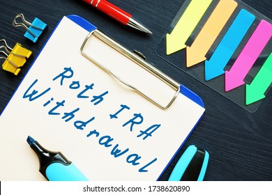 Financial Concept About Roth IRA Withdrawal With Sign On The Piece Of Paper.