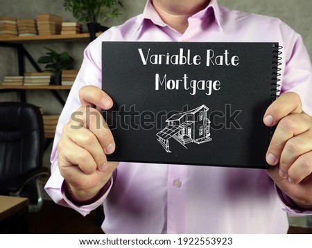 Financial concept about Variable Rate Mortgage with sign on the sheet.