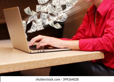 Financial Concept. Make Money On The Internet. Woman With Laptop In Cafe Shop