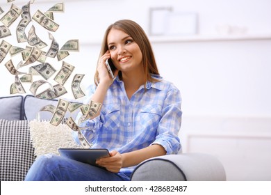 Financial Concept. Make Money On The Internet. Pretty Woman Talking On Cell And Holding Tablet Computer