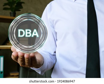  Financial concept meaning Doing Business As DBA with inscription on the page.